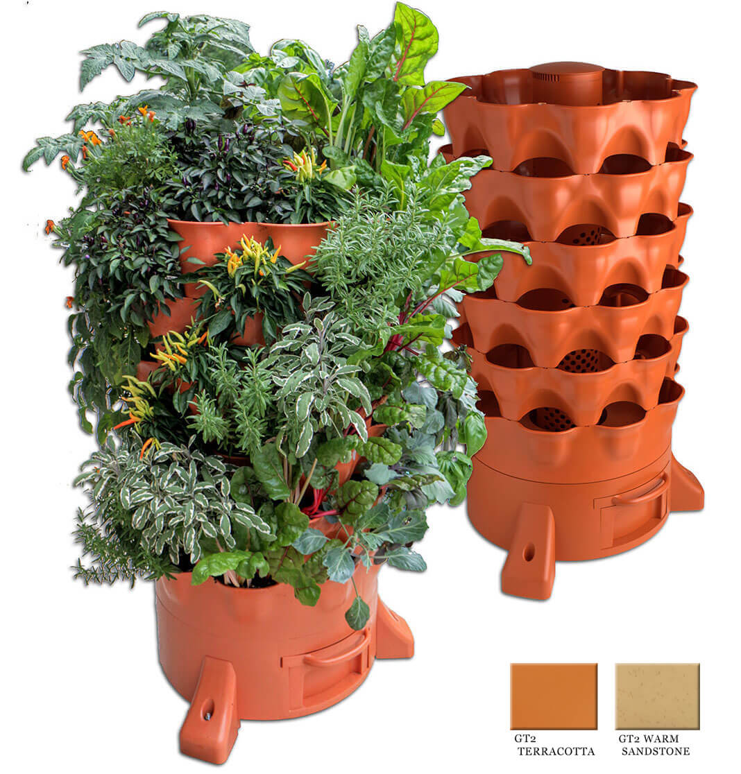 Grow Bags with Vegetable Saplings in a Vertical Stand Outside